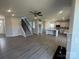 Bright, open-concept living space showcases a seamless flow from living room to kitchen at 1459 Mocksville Hwy # 19, Statesville, NC 28625