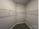Empty walk-in closet with ample shelving and carpet flooring at 1459 Mocksville Hwy # 19, Statesville, NC 28625