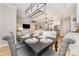 Open floor plan with dining room with table set for six at 148 Powder Spring Dr, Statesville, NC 28677
