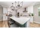 Modern kitchen with stainless steel appliances and a large center island at 148 Powder Spring Dr, Statesville, NC 28677