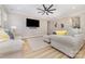 Spacious living room with comfortable seating and ceiling fan at 148 Powder Spring Dr, Statesville, NC 28677