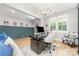 Comfortable home office with stylish decor, desk, and a cozy chair at 148 Powder Spring Dr, Statesville, NC 28677
