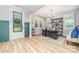 Bright home office featuring a large desk, built-in shelves, and ample natural light at 148 Powder Spring Dr, Statesville, NC 28677