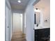 Hallway with closet and half bathroom at 1520 Enochville Rd, Kannapolis, NC 28081