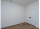 This bedroom with modern flooring features a closet with doors and a light switch ready for personal touches at 1528 Enochville Rd, Kannapolis, NC 28081