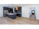 Spacious kitchen and living room with white counters and modern light fixtures at 1528 Enochville Rd, Kannapolis, NC 28081