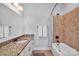 Bathroom with granite counters, a tub/shower combo, and modern fixtures at 1600 Buckland Ct, Indian Land, SC 29707