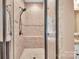 Bathroom with a large tiled shower with built-in bench and glass enclosure at 1600 Buckland Ct, Indian Land, SC 29707