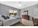 Relax in this bedroom with natural light, carpeted floors, and neutral walls at 1600 Buckland Ct, Indian Land, SC 29707