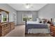 Bedroom with a bed, furniture, neutral walls, and a bright window at 1600 Buckland Ct, Indian Land, SC 29707
