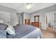 Bedroom with wooden dressers and en-suite bathroom at 1600 Buckland Ct, Indian Land, SC 29707