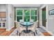 Cozy breakfast nook with hardwood floors, a view of the lush outdoors, and natural light at 1600 Buckland Ct, Indian Land, SC 29707