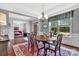 Elegant dining room featuring a classic table set and a large window overlooking the outdoors at 1600 Buckland Ct, Indian Land, SC 29707