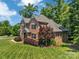 Charming brick home with a manicured lawn and lush landscaping at 1600 Buckland Ct, Indian Land, SC 29707