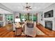 Bright living room featuring a fireplace, hardwood floors, coffered ceiling, and lots of natural light at 1600 Buckland Ct, Indian Land, SC 29707