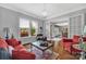 Bright living room with hardwood floors, a large window, and elegant decor at 1600 Buckland Ct, Indian Land, SC 29707