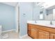 Bathroom features a double sink vanity with wood cabinets and a neutral tiled floor at 1817 Tradd Ave, Clover, SC 29710