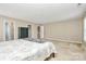 Spacious bedroom with carpet flooring, featuring multiple doorways at 1817 Tradd Ave, Clover, SC 29710