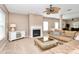Bright living room featuring neutral paint, plush carpeting, fireplace, and plenty of natural light at 1817 Tradd Ave, Clover, SC 29710