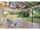 Inviting pergola-covered deck with a ceiling fan and comfortable seating, perfect for outdoor relaxation at 1817 Tradd Ave, Clover, SC 29710