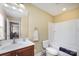Clean bathroom featuring single sink, shower-tub combo, and neutral tones for a relaxing atmosphere at 18715 Coachmans Trce, Cornelius, NC 28031