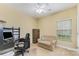 Functional home office with carpet, fan, window and plenty of room for a desk and chair at 18715 Coachmans Trce, Cornelius, NC 28031