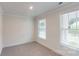 Bedroom with carpeted flooring, two windows with blinds, and neutral paint at 2070 Skyhawk Dr, York, SC 29745