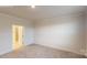 Spacious bedroom features a carpeted floor, ensuite bathroom and walk-in closet at 2070 Skyhawk Dr, York, SC 29745