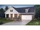Charming single-Gathering home with stone accents, white trim, a two-car garage, and manicured landscaping at 2070 Skyhawk Dr, York, SC 29745