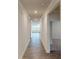 Inviting hallway showcasing hardwood floors, leading to a bright living space with natural light at 2070 Skyhawk Dr, York, SC 29745