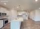 Spacious kitchen with stainless steel appliances, a center island, and tile backsplash at 2070 Skyhawk Dr, York, SC 29745