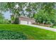 Charming brick home with a manicured lawn and a three-car garage at 2300 Richardson Dr, Charlotte, NC 28211