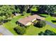 A beautiful aerial view of a landscaped home with a private backyard and mature trees at 2326 Horseshoe Bend Ne Rd, Hickory, NC 28601