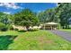 Lovely home with a convenient carport, situated on a large lot with mature trees at 2326 Horseshoe Bend Ne Rd, Hickory, NC 28601