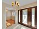 Inviting foyer featuring tiled floors, ornate front doors, and views into adjoining rooms at 2326 Horseshoe Bend Ne Rd, Hickory, NC 28601