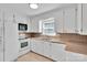 Cozy kitchen with white cabinetry, tile backsplash, and appliances ready for cooking at 2326 Horseshoe Bend Ne Rd, Hickory, NC 28601