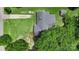 Expansive lot with well-maintained home and detached shed, surrounded by mature trees and landscaping at 2536 Cambridge Dr, Lancaster, SC 29720