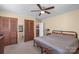 Bedroom featuring a bed with neutral decor, closet space, and an ensuite door at 2536 Cambridge Dr, Lancaster, SC 29720
