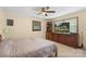 Bright bedroom offers a ceiling fan, built-in shelving, and large window, perfect for relaxation at 2536 Cambridge Dr, Lancaster, SC 29720