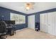 Bright navy bedroom featuring natural light and two closets with ample storage space at 2536 Cambridge Dr, Lancaster, SC 29720