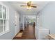 Hallway featuring hardwood style floors with open view to the kitchen and the dining room at 2536 Cambridge Dr, Lancaster, SC 29720