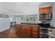 Kitchen features stainless steel appliances and is open to the breakfast nook and the dining room at 2536 Cambridge Dr, Lancaster, SC 29720
