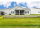 Exterior backyard featuring a charming patio and lush green grass, great for outdoor enjoyment at 25952 Appleyard Ct, Lancaster, SC 29720