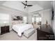 Spacious main bedroom with tray ceiling, neutral décor, and comfortable bedding for a relaxing retreat at 25952 Appleyard Ct, Lancaster, SC 29720