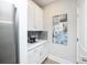 Neatly organized pantry with stylish cabinetry, countertop, and neutral paint at 25952 Appleyard Ct, Lancaster, SC 29720
