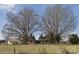 Charming home with mature trees on a lush green lawn at 2808 Water Plant Rd, Maiden, NC 28650