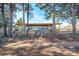 Charming home exterior featuring a covered porch, fenced yard, and convenient carport at 2808 Water Plant Rd, Maiden, NC 28650