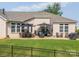Backyard features a fenced yard and a patio area with outdoor seating and a grill, perfect for entertaining at 3006 Constitution Ln, Gastonia, NC 28056