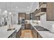 Modern kitchen featuring stainless steel appliances, a large island, and plenty of storage space at 3006 Constitution Ln, Gastonia, NC 28056