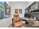 Home office with leather chair, built-in cabinets, and natural light at 3006 Constitution Ln, Gastonia, NC 28056